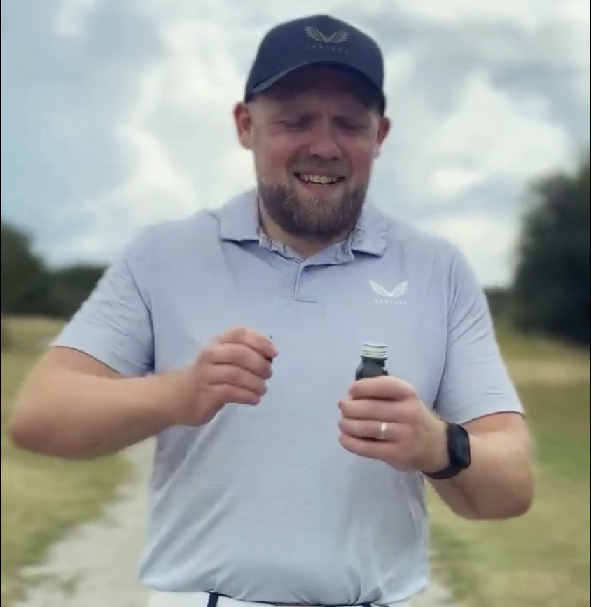 Golfer opening a GC18 shot